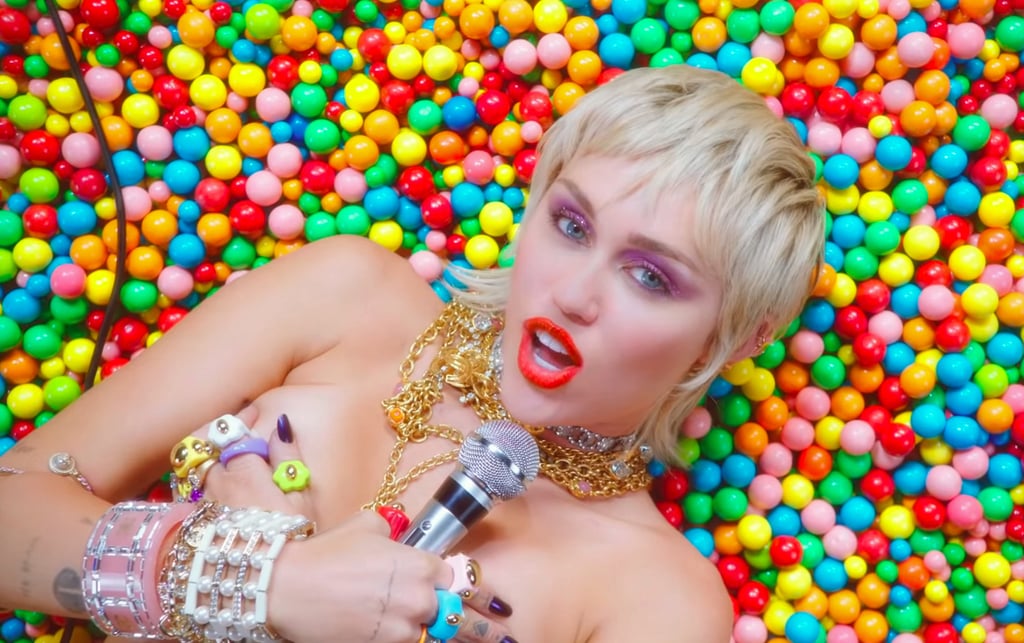 Miley Cyrus Wearing Colourful Jewellery in "Midnight Sky"