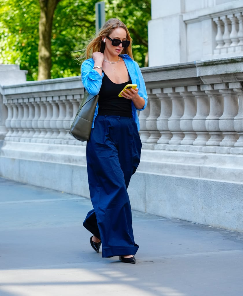 Jennifer Lawrence Wears a Blue Button-Down and Pants in NYC
