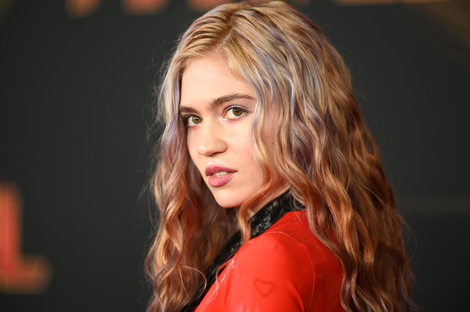 See Photos of Grimes's New 