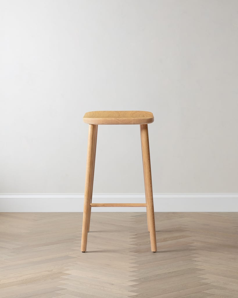 Quince Solid Oak Backless Counter Stool ($300)
Picking the perfect stool can be overwhelming. My best advice? When in doubt, go for something sleek and simple. This solid oak counter stool is in a neutral, natural finish that will complement any home aesthetic.