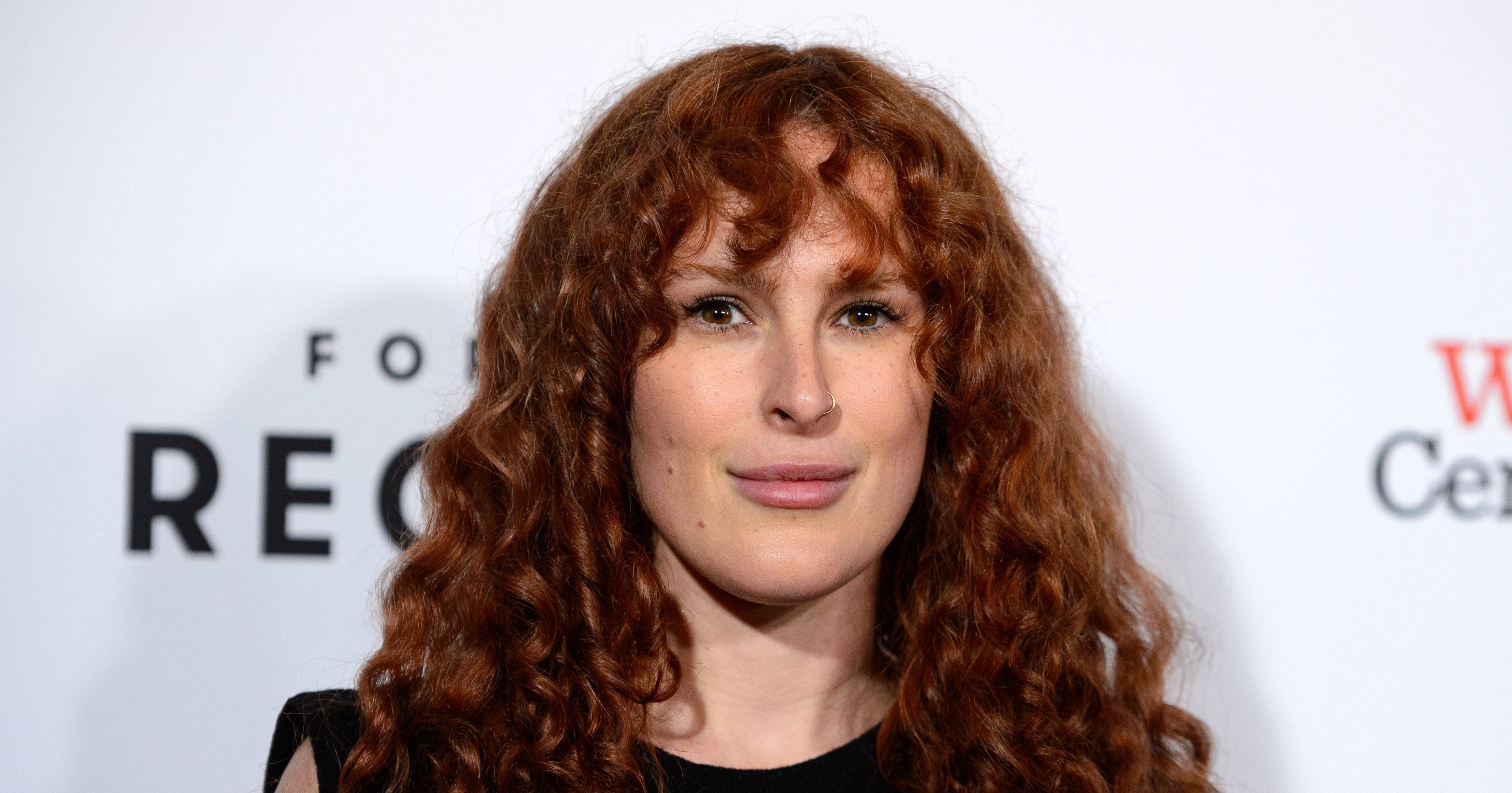 actress with frizzy red hair