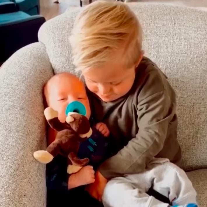 Boy With Down Syndrome Comforts Baby Brother Video Popsugar Family
