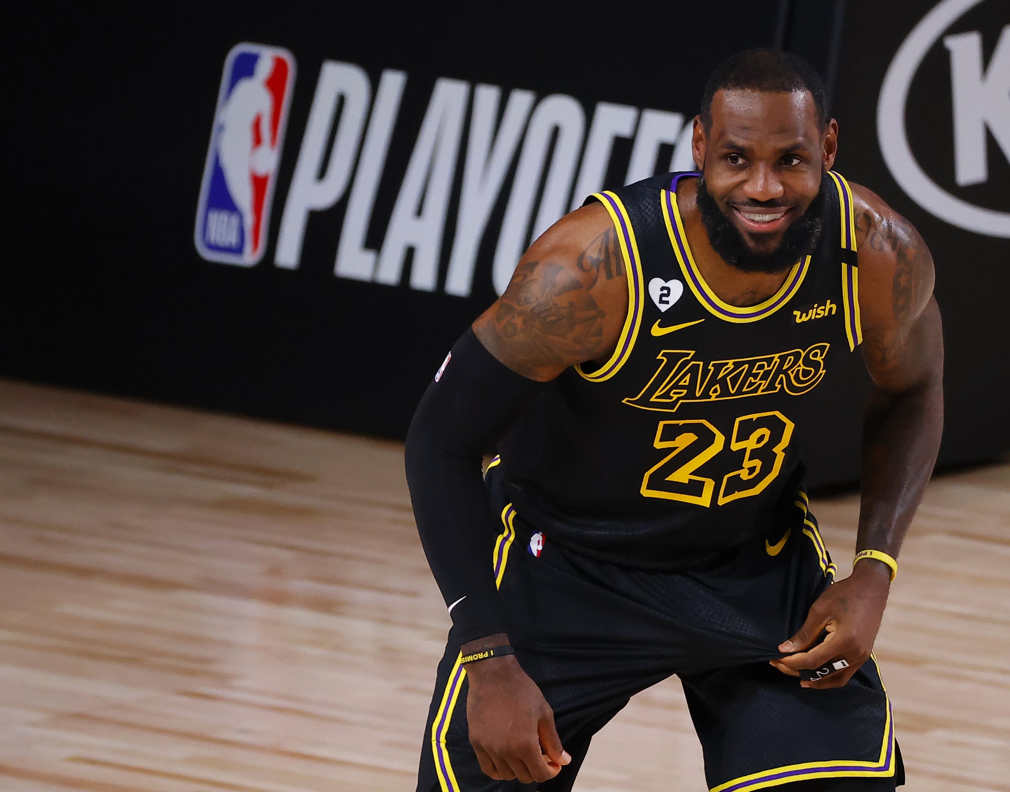 LAKE BUENA VISTA, FLORIDA - AUGUST 24: LeBron James #23 of the Los Angeles Lakers smiles as he gets ready for a play against the Portland Trail Blazers in Game Four of the Western Conference First Round during the 2020 NBA Playoffs at AdventHealth Arena at ESPN Wide World Of Sports Complex on August 24, 2020 in Lake Buena Vista, Florida. NOTE TO USER: User expressly acknowledges and agrees that, by downloading and or using this photograph, User is consenting to the terms and conditions of the Getty Images Licence Agreement. (Photo by Kevin C. Cox/Getty Images)