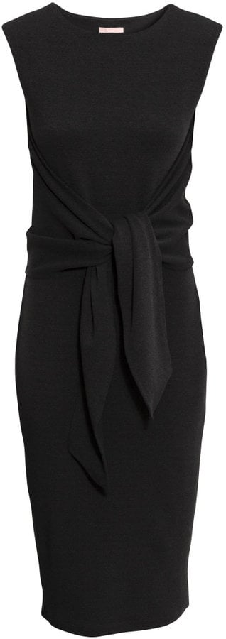 For the fancier events penciled in on your calendar, opt for a sophisticated silhouette like this sleek black dress with a tied front detail.
 Sleeveless Dress ($60)
