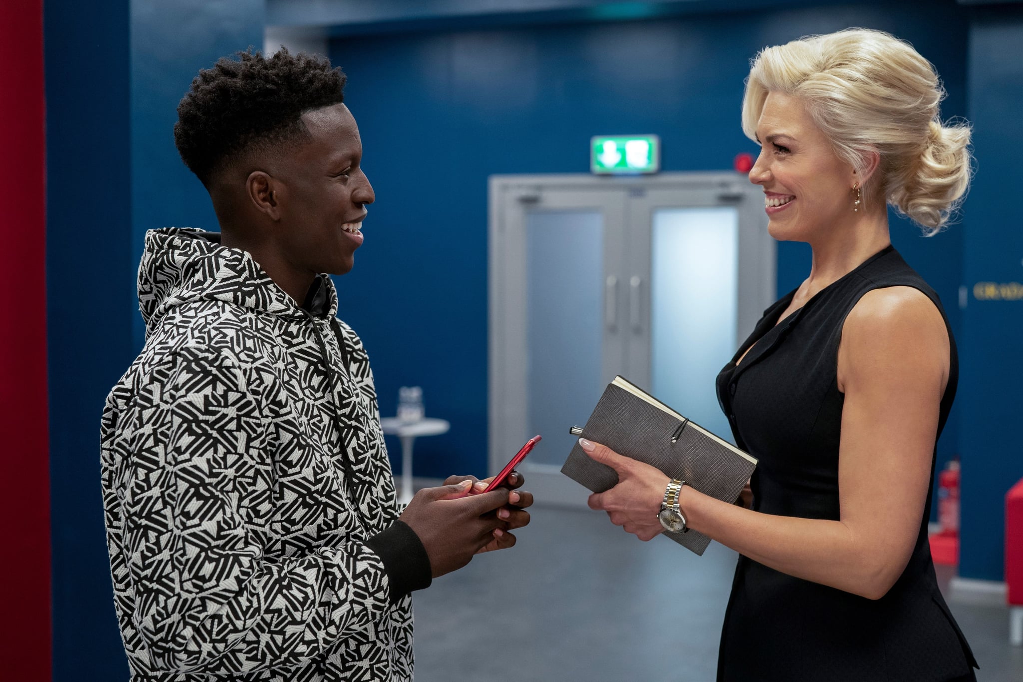 TED LASSO, from left: Toheeb Jimoh, Hannah Waddingham, Headspace', (Season 2, ep. 207, aired Sept. 3, 2021). photo: Colin Hutton / Apple TV+ / Courtesy Everett Collection