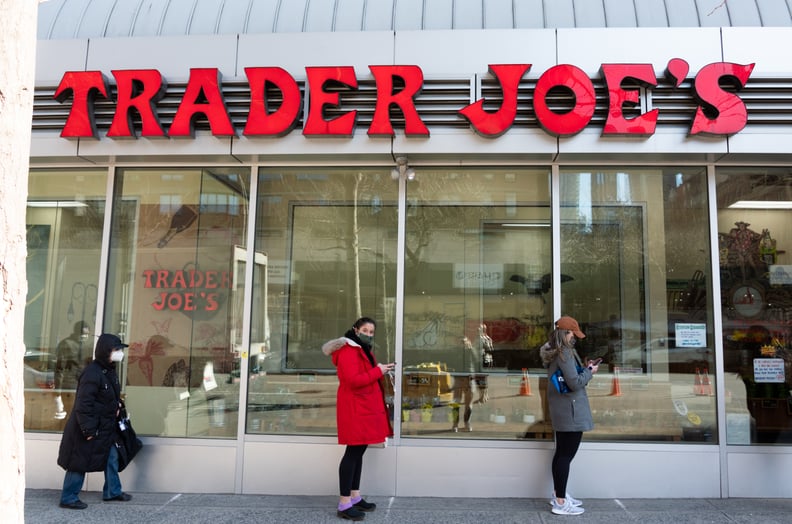 NEW YORK, NEW YORK - MARCH 19: People stand in line outside Trader Joe's in Kips Bay amid the coronavirus pandemic on March 19, 2021 in New York City. After undergoing various shutdown orders for the past 12 months the city is currently in phase 4 of its 