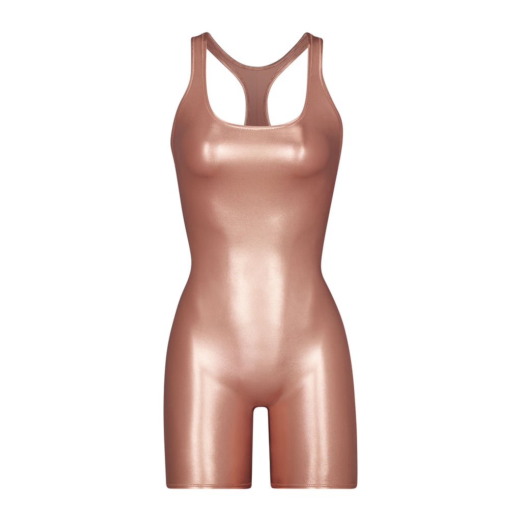 Skims Metallic Swim Cycle Suit in Champagne ($128)