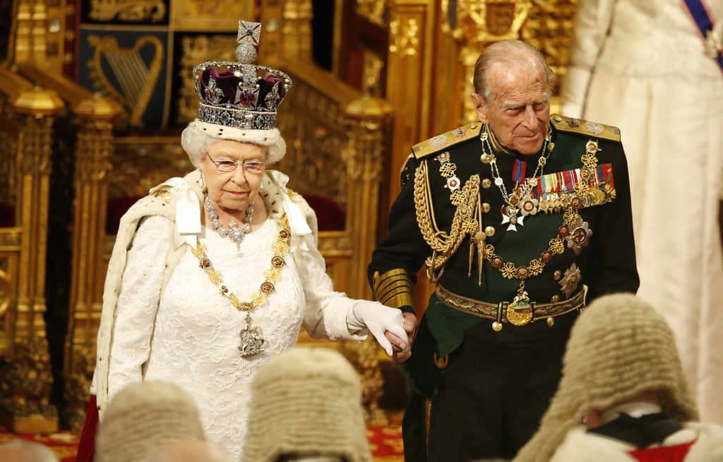 Prince Philip held hands with Queen Elizabeth II during the State Opening of Parliament in the House of Lords at the Palace of Westminster in London in May 2016.