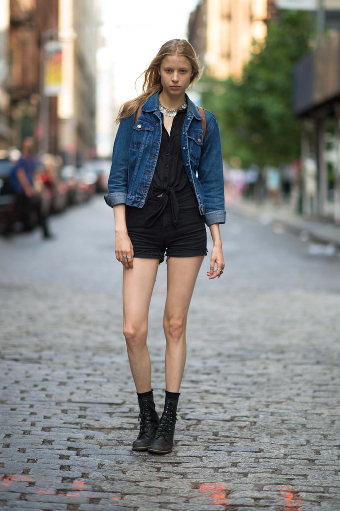 This all-black look was primed for Summer with a knotted button-down, a classic jean jacket, and cool cutoffs.
