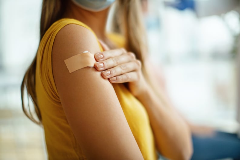 Young woman getting COVID vaccine booster