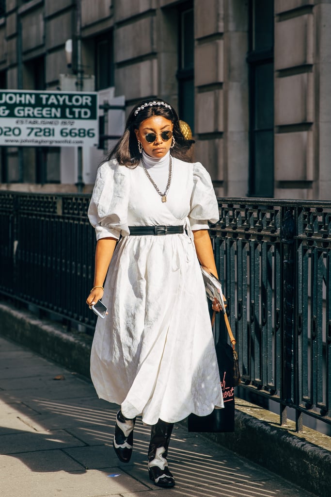 Pair your favorite white summer dress with a belt and cowboy boots to bring your look western flair.