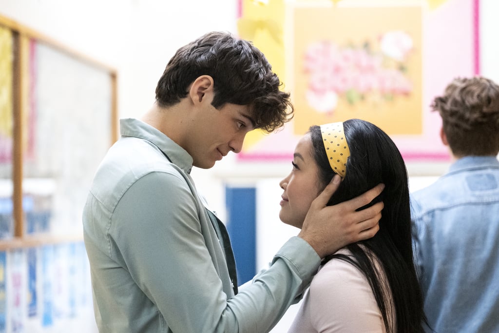 It looks like Lara Jean (Lana Condor) has two guys vying for her heart in Netflix's P.S. I Still Love You. On Thursday, the streaming service unveiled the first look at the much-anticipated sequel to 2018's To All the Boys I've Loved Before. While one photo shows Lara and her now-official boyfriend, Peter (Noah Centineo), sending off paper lanterns in the sky, another shows Lara sharing a very romantic moment with her childhood friend John Ambrose McClaren (Jordan Fisher). 
At the end of the first movie, John (who was played by Jordan Burtchett) pops up at Lara's doorstep after receiving one of her love letters. In March 2019, it was announced that Fisher would be taking on the role in the upcoming sequel. "They're true friends," Condor told Entertainment Weekly of Lara Jean and John's relationship. "But because you can love your friend very much, you get confused. You're like, 'Do I love him or do I love him as a friend?' So he's really there to mix it up."
So, will Lara be Team Peter or Team John? Be sure to tune in on Feb. 12 to find out. In the meantime, take a look at the dreamy first photos.