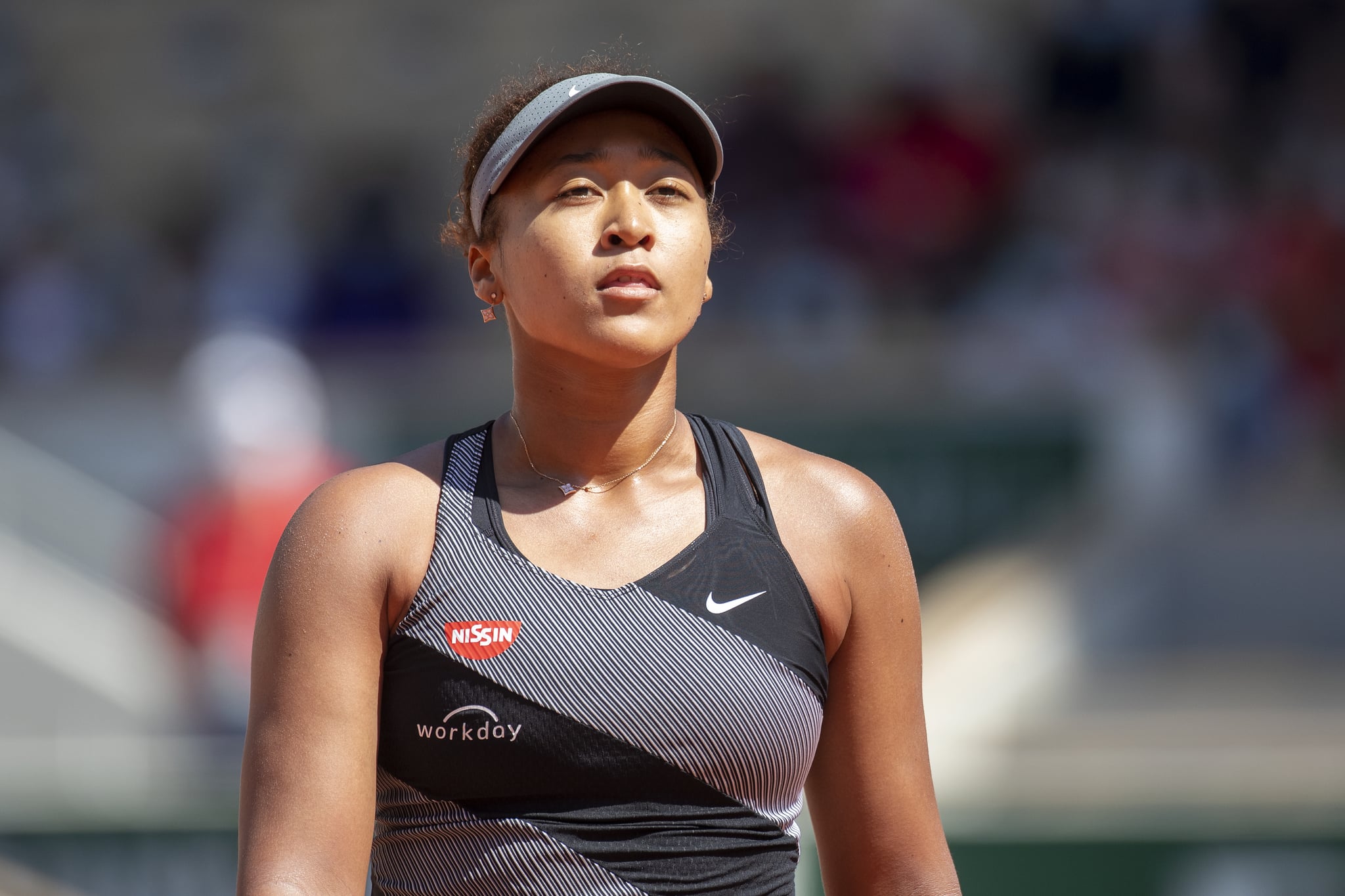 PARIS, FRANCE May 30. Naomi Osaka of Japan during her match against Patricia Maria Tig of Romania in the first round of the Women's Singles competition on Court Philippe-Chatrier at the 2021 French Open Tennis Tournament at Roland Garros on May 30th 2021 in Paris, France. (Photo by Tim Clayton/Corbis via Getty Images)