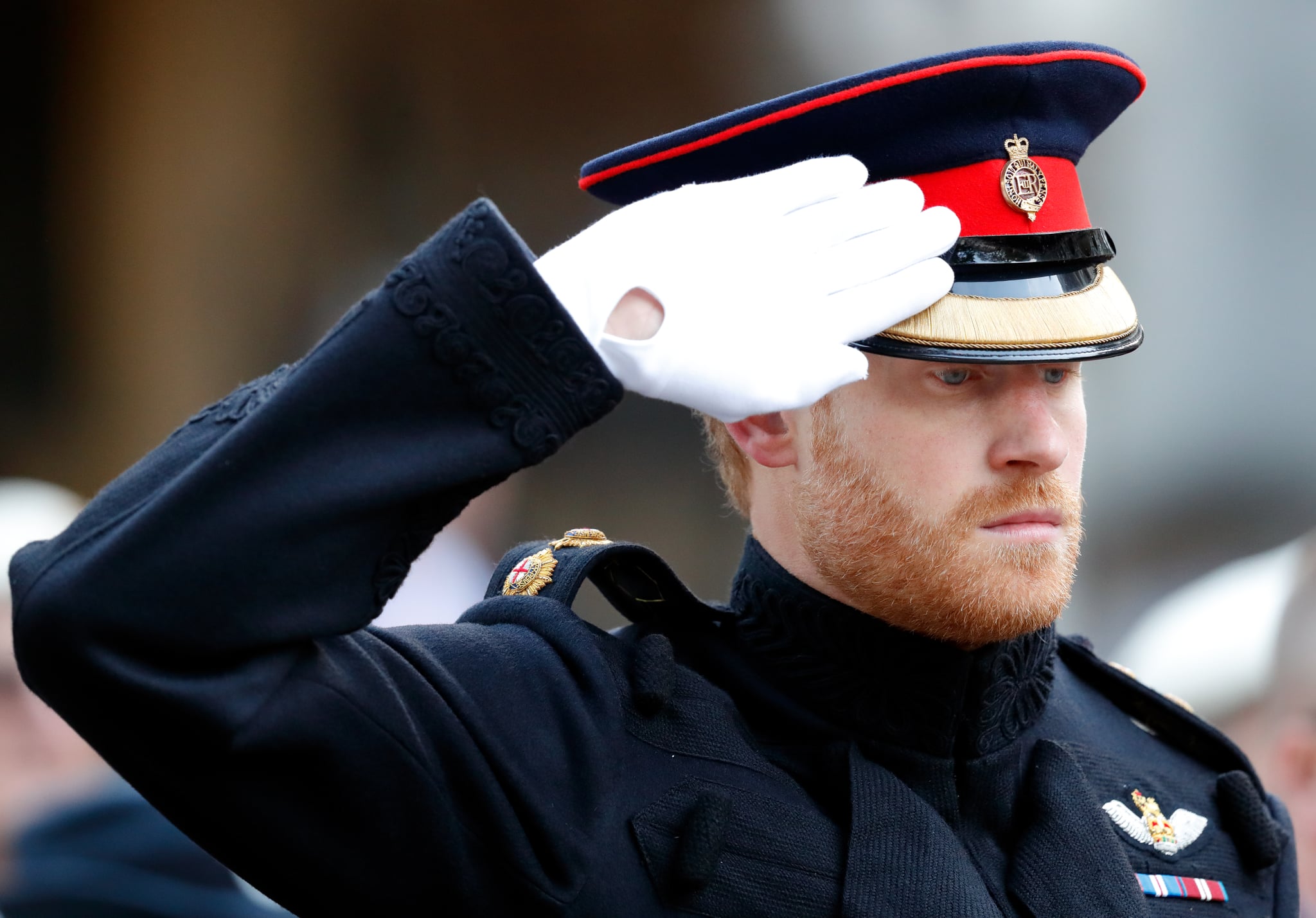 LONDON, UNITED KINGDOM - NOVEMBER 09: (EMBARGOED FOR PUBLICATION IN UK NEWSPAPERS UNTIL 48 HOURS AFTER CREATE DATE AND TIME) Prince Harry salutes as he visits the Field of Remembrance at Westminster Abbey on November 9, 2017 in London, England. The first Field of Remembrance was held in the grounds of Westminster Abbey in November 1928 when only two Remembrance Tribute Crosses were planted, but has now grown to approximately 70,000 crosses planted. (Photo by Max Mumby/Indigo/Getty Images)