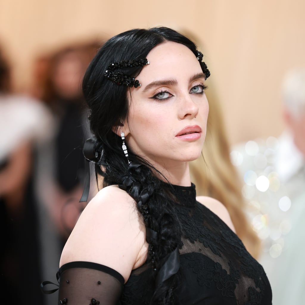Billie Eilish Wears a Leopard Bra and a Pleated Miniskirt Over Baggy Pants