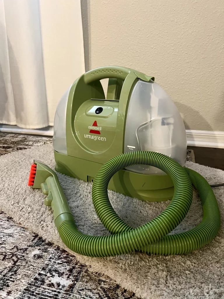 Bissell Little Green Multi-Purpose Carpet Cleaner ($79, originally $124) 
For those with furry friends: this multi-purpose carpet cleaner is a top-rated Amazon product for a reason. With its powerful suction, use it to remove tough pet spots and stains from the carpet or the inside of your car. Using its tough stain tool, you can spray, scrub, and suction away other stains and spills, too. Read our Bissell Little Green Portable Cleaner review for more.
Editor Quote: "I saw results within a few minutes, and I noticed that my upholstery looked visibly more vibrant and refreshed — particularly my vintage rugs and bath mats, which have a tendency to look pretty discolored and worn down. The aftercare was also incredibly easy — I simply unplugged the cleaner, emptied and rinsed the water tank, and let the tank air dry." — Kyley Warren, former assistant shopping editor