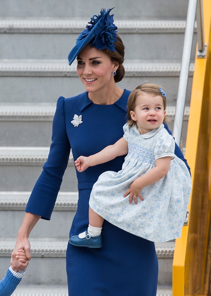 She accessorized with a maple leaf pin in honor of Canada, and daughter Charlotte accessorized with shoes that matched mom's dress. 
