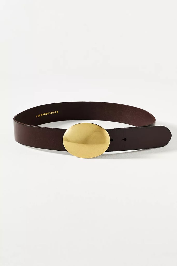 By Anthropologie Oval Plaque Belt ($78)
From classic plaid prints to soft suede fringe, western accents are everywhere this season. This timeless belt lets you take a bit of a more subtle approach to the trend thanks to the metal oval buckle and thick leather strap.