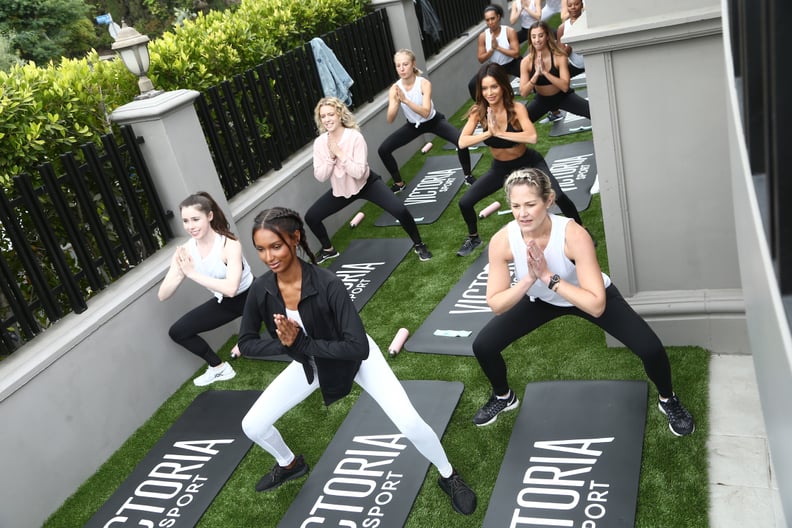 LOS ANGELES, CA - MAY 24:  Jasmine Tookes (C) and guests attend Victorias Secret and Tone It Up Host a Slay Then Rosé workout with Angel Jasmine Tookes on May 24, 2018 in Los Angeles, California.  (Photo by Tommaso Boddi/Getty Images for Victoria's Secret
