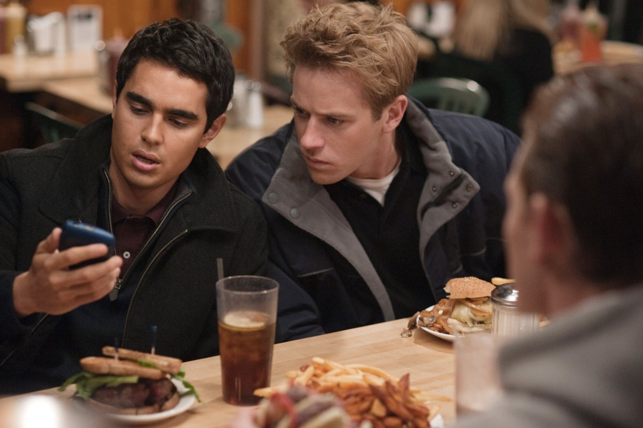 THE SOCIAL NETWORK, from left: Max Minghella, Armie Hammer, 2010. ph: Merrick Morton/Columbia Pictures/Courtesy Everett Collection