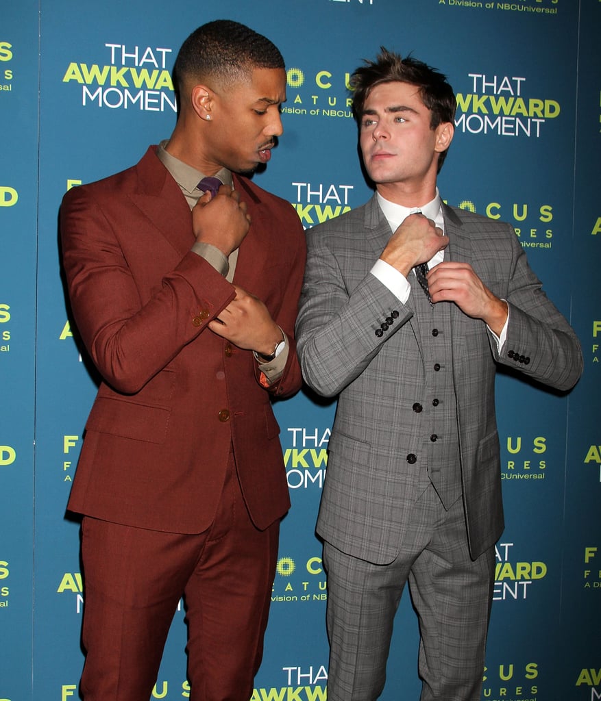 He and Zac Efron straightened their ties at the NYC screening of That Awkward Moment in January 2014.