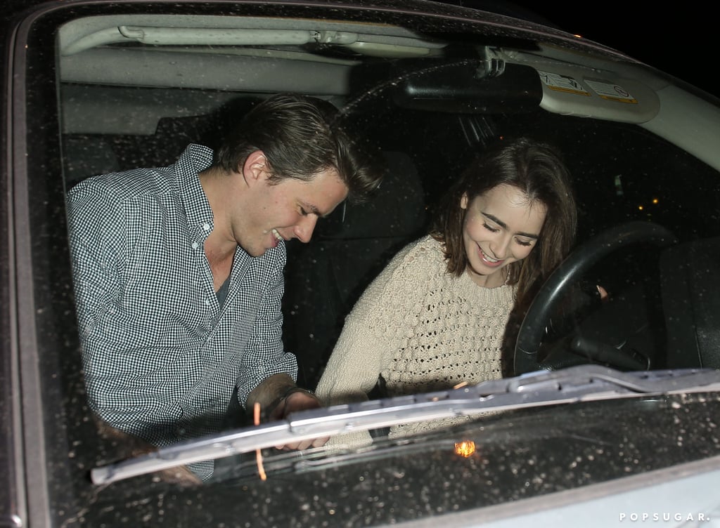 Lily Collins arrived with her rumored new boyfriend, Thomas Cocquerel.