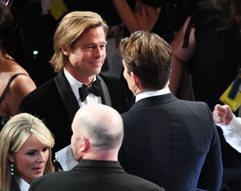 Photos of Brad Pitt and Bradley Cooper Talking at the Oscars