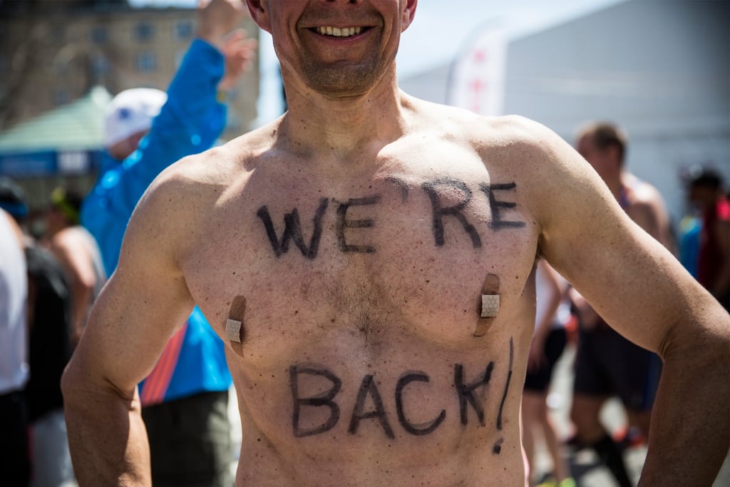 A man wrote "We're back!" on his chest for the 2014 race.