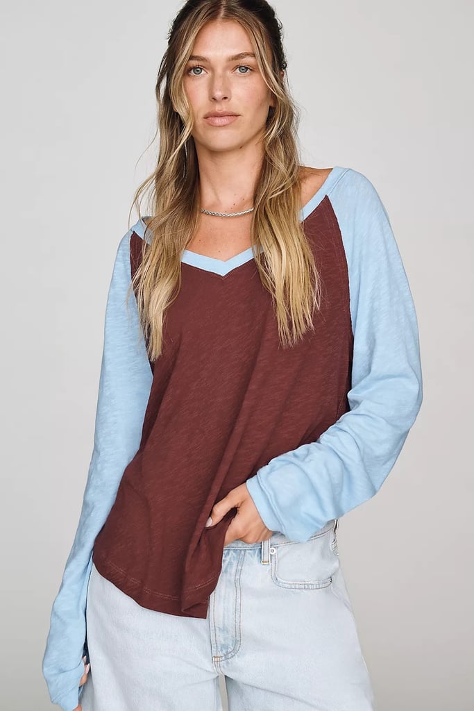 Pilcro Cotton V-Neck Knit Top ($40, originally $58)
The pieces I reach for the most in my wardrobe tend to have a flowy silhouette and the perfect balance of style and comfort. This baggy V-neck top perfectly fits my criteria. From the colorblocked design to the oversize fit, consider this top the perfect everyday find.