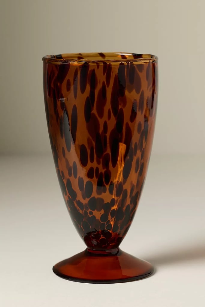 Anthropologie Gia Tortoise Goblet ($16)
There is nothing more festive than rotating glassware to celebrate the holidays or the start of a new season. Add these gorgeous tortoise glasses to your bar cart to set a warm, inviting tone for fall. The generous size makes them perfect for any type of beverage or event.