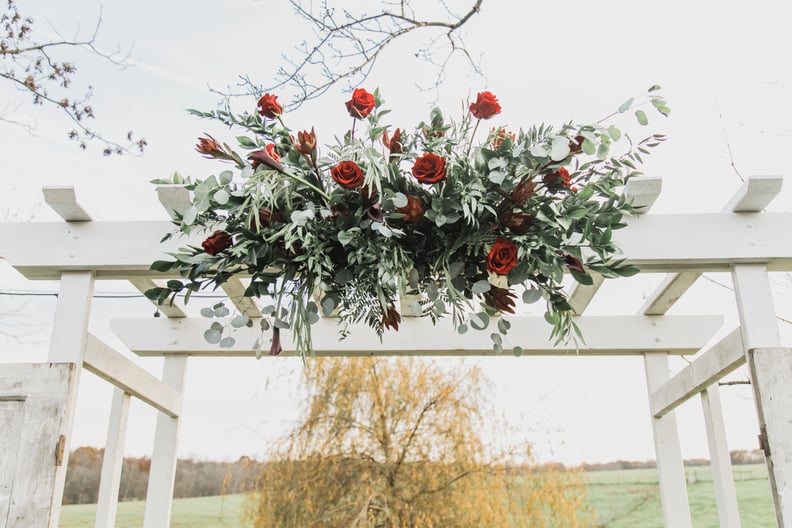 DIY Flower-Filled Vow Backdrop