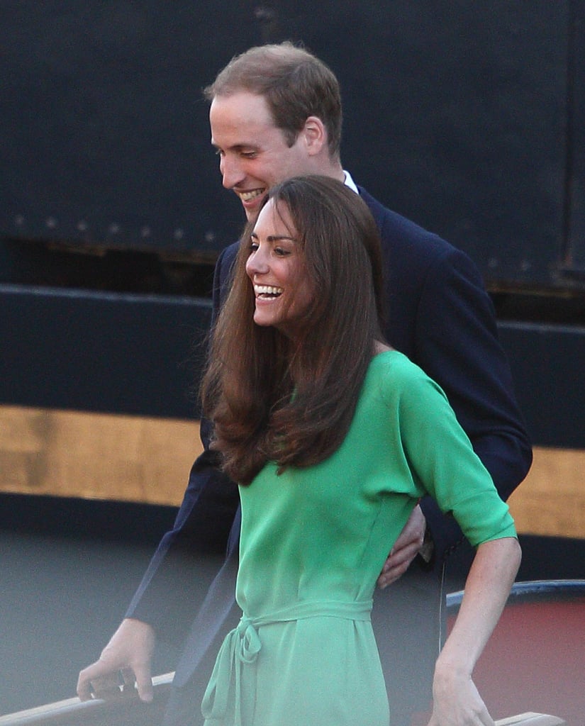 Kate Middleton and Prince William let out a laugh at the July 2011 prewedding festivities of Zara Phillips and Mike Tindall in Scotland.
