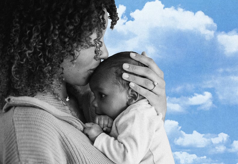Woman Kissing Her Baby's Forehead on a Blue Sky and Clouds Background