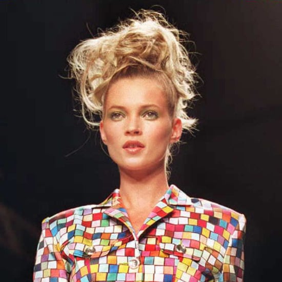 Walking in a runway show in 1995, Kate was in her '90s glory with wild hair and emerald green eye shadow.