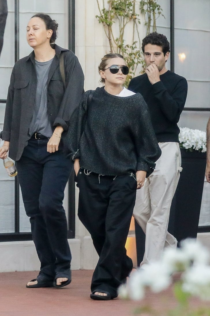 Ashley Olsen Wearing Black Trousers and Slides to the Movies