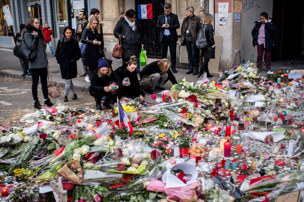 Flowers piled up near the Bataclan Theater in Paris.