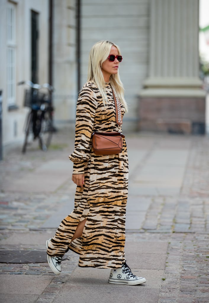 Complement animal-print puff sleeves with shades of brown accessories