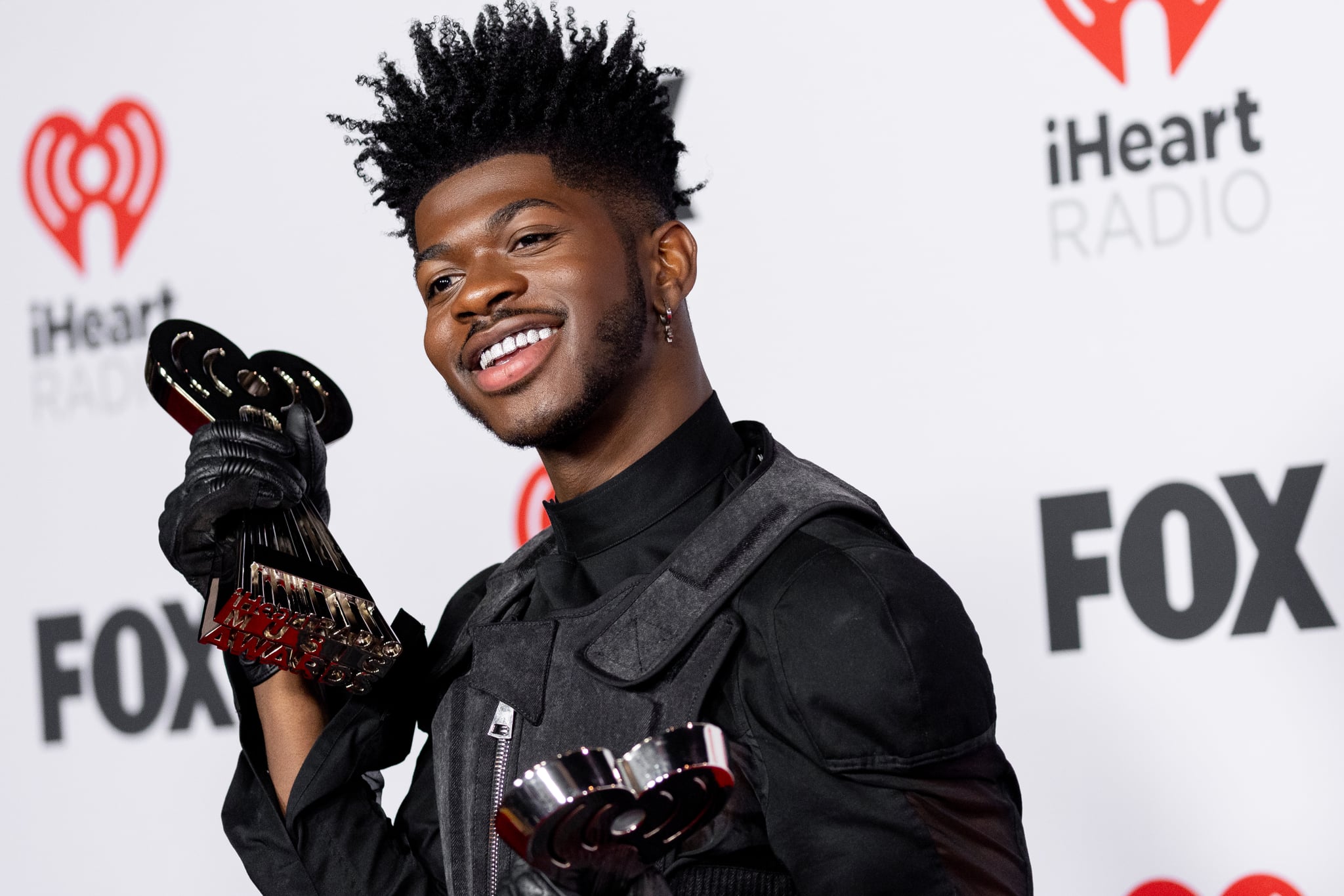 LOS ANGELES, CALIFORNIA - MARCH 22: Lil Nas X attends the 2022 iHeartRadio Music Awards press room at Shrine Auditorium and Expo Hall on March 22, 2022 in Los Angeles, California. (Photo by Emma McIntyre/WireImage)
