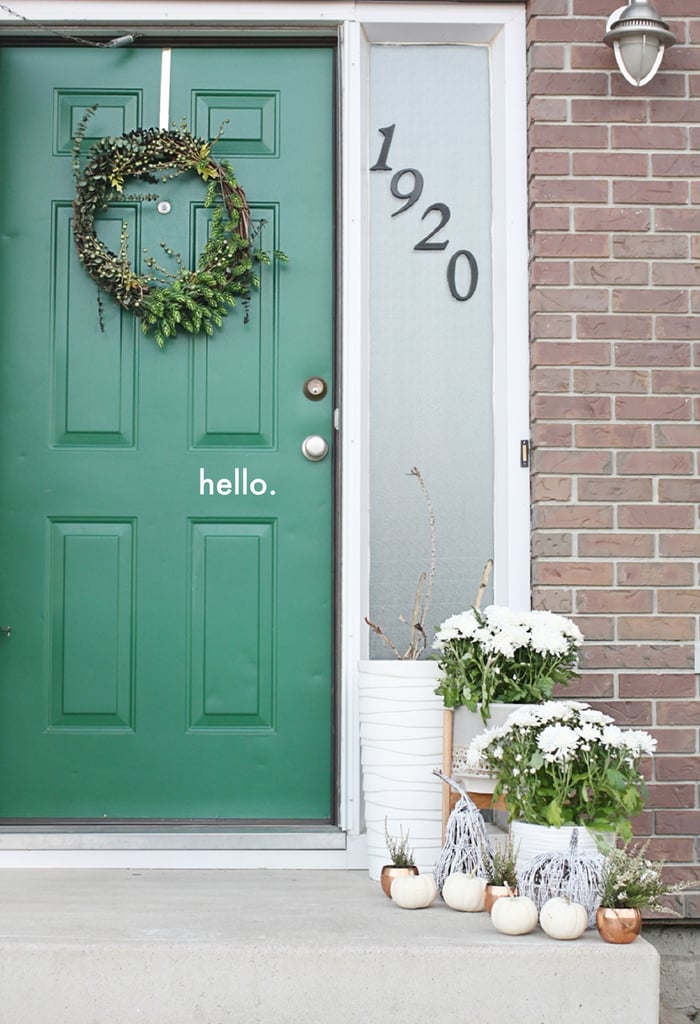 White Porch Decor on a Colorful Door