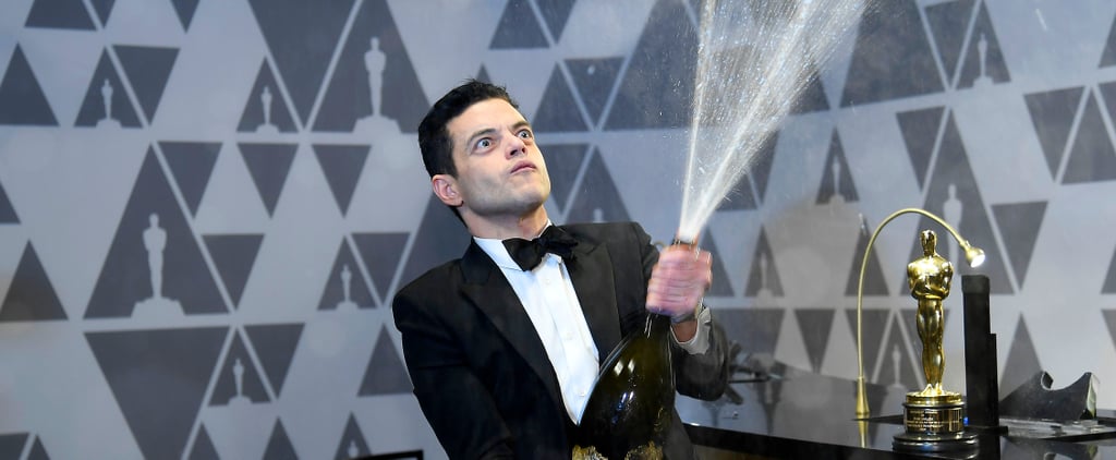 I Hope Rami Malek Didn't Ruin Any Outfits With His Wild Champagne Spray at the Oscars