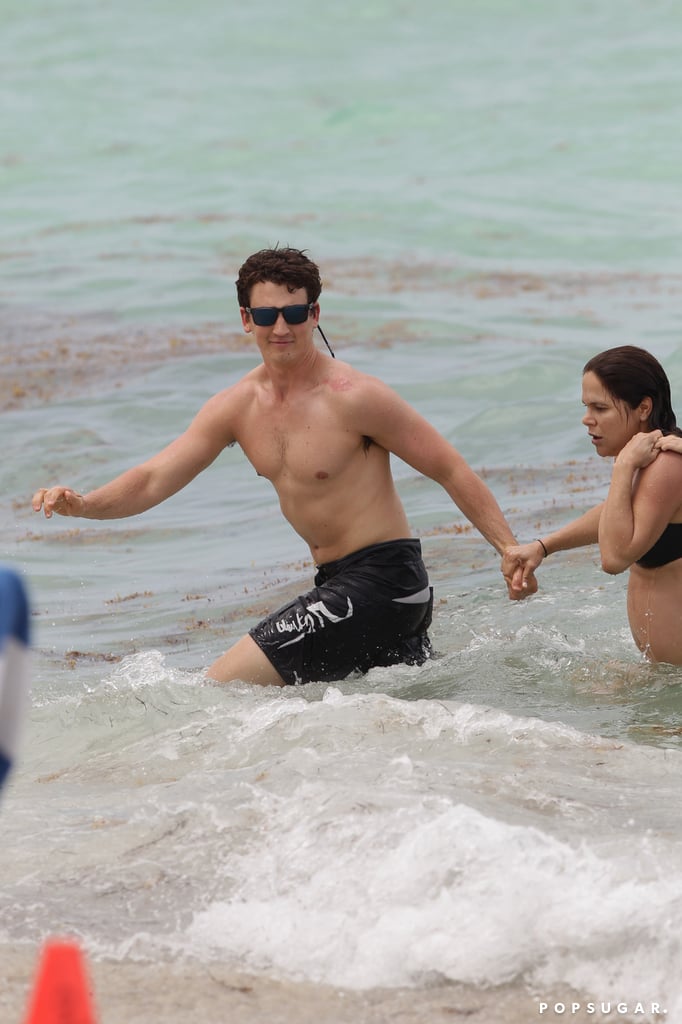 Miles Teller and His Girlfriend on the Beach in Miami