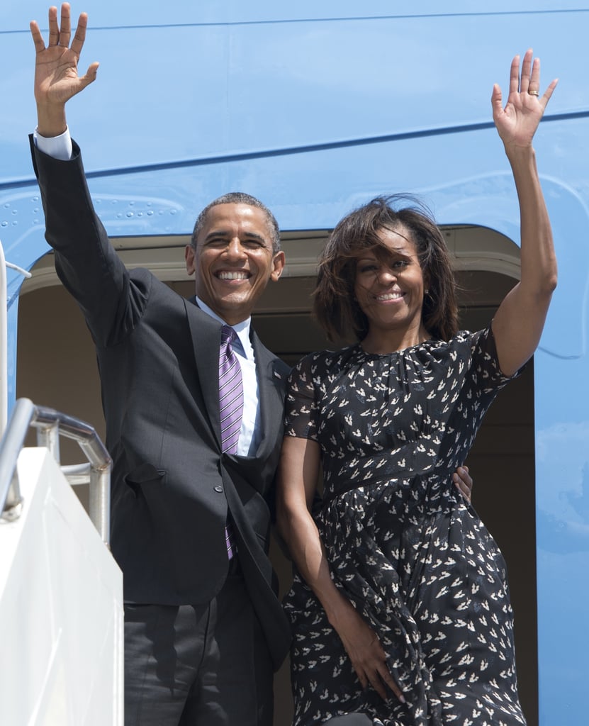 The Obamas waved to onlookers as they left Dar es Salaam, Tanzania, in July 2013.