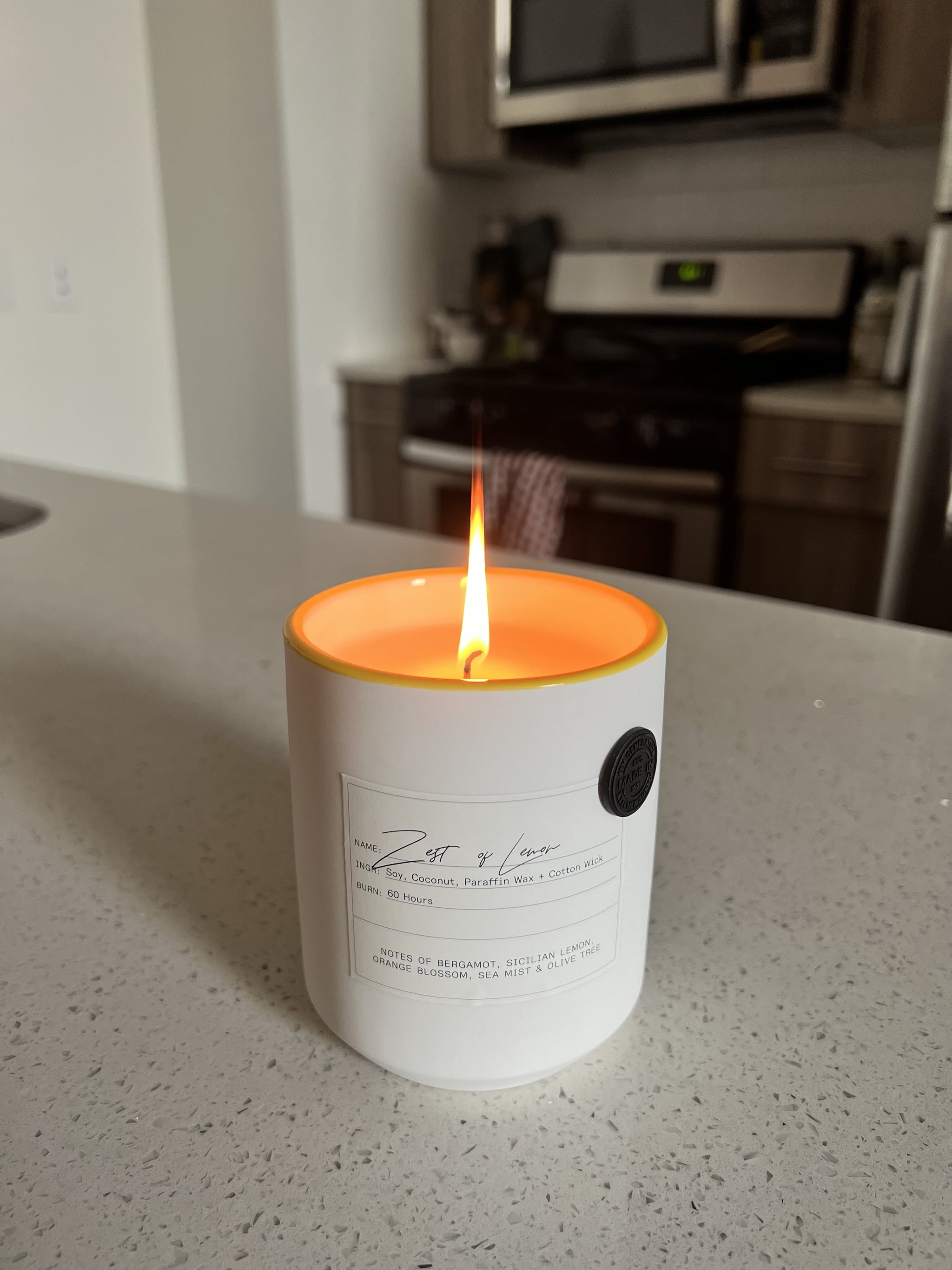 Made In Kitchen Candle in Zest of Lemon on kitchen countertop.