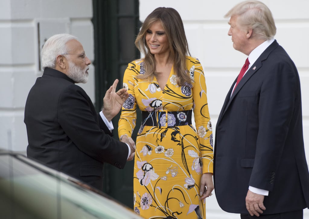 The Saffron-Colored Dress Featured White and Liliac Floral Designs