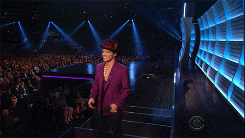 Bruno Mars tried to gain his composure before introducing her highness Adele.