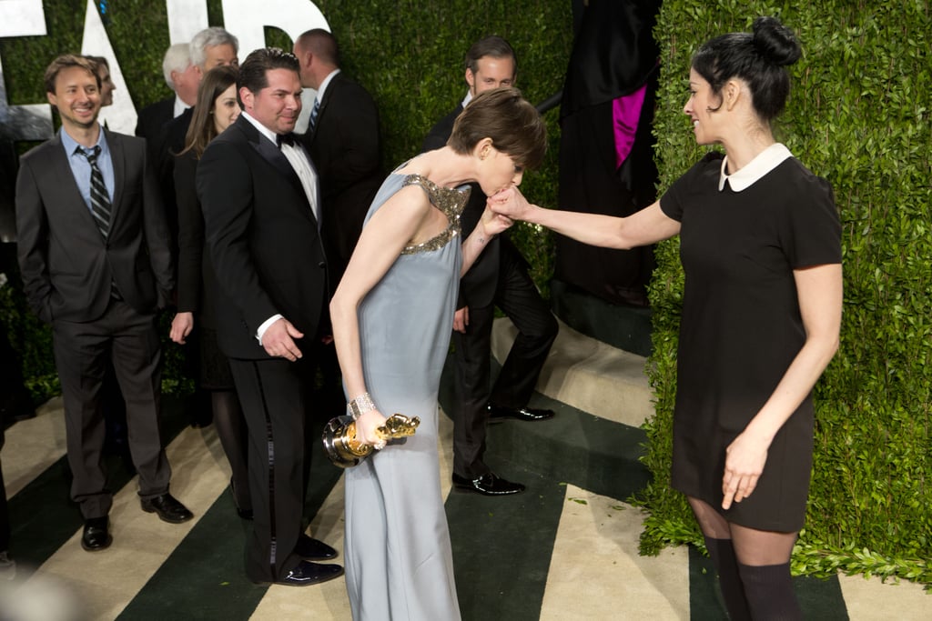 Anne Hathaway kissed Sarah Silverman's hand on the red carpet at the Vanity Fair Oscar party.
Anne Hathaway kissed Sarah Silverman's hand on the red carpet at the Vanity Fair Oscar party.