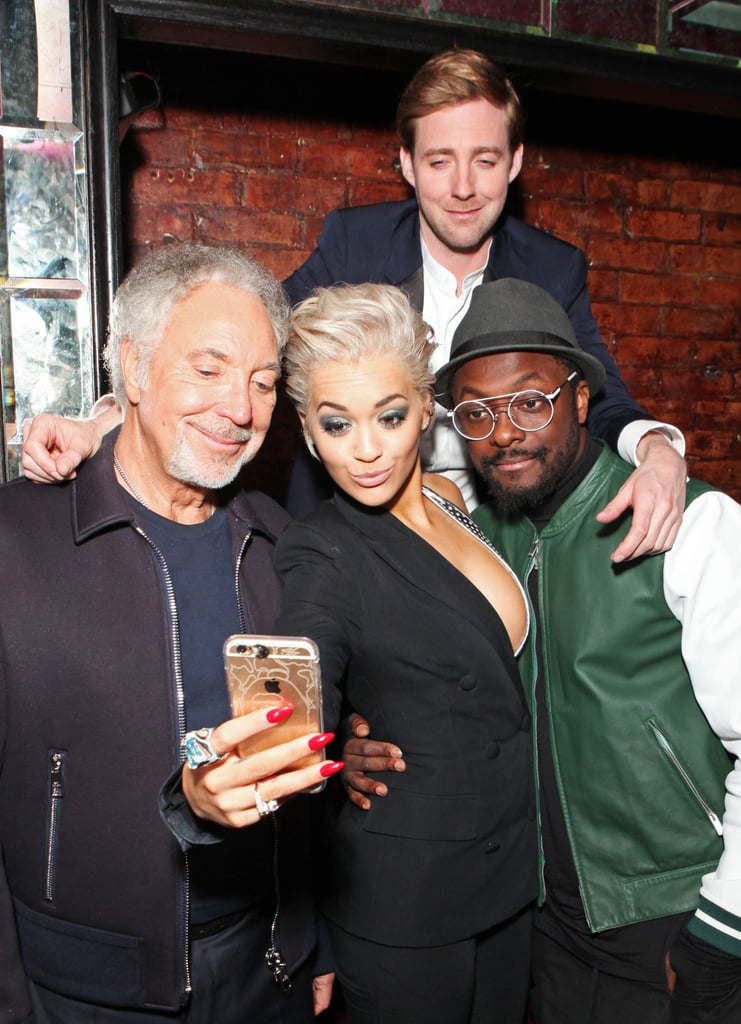 Rita Ora got a photo with Sir Tom Jones, Rocky Wilson, and will.i.am in London in March 2015.