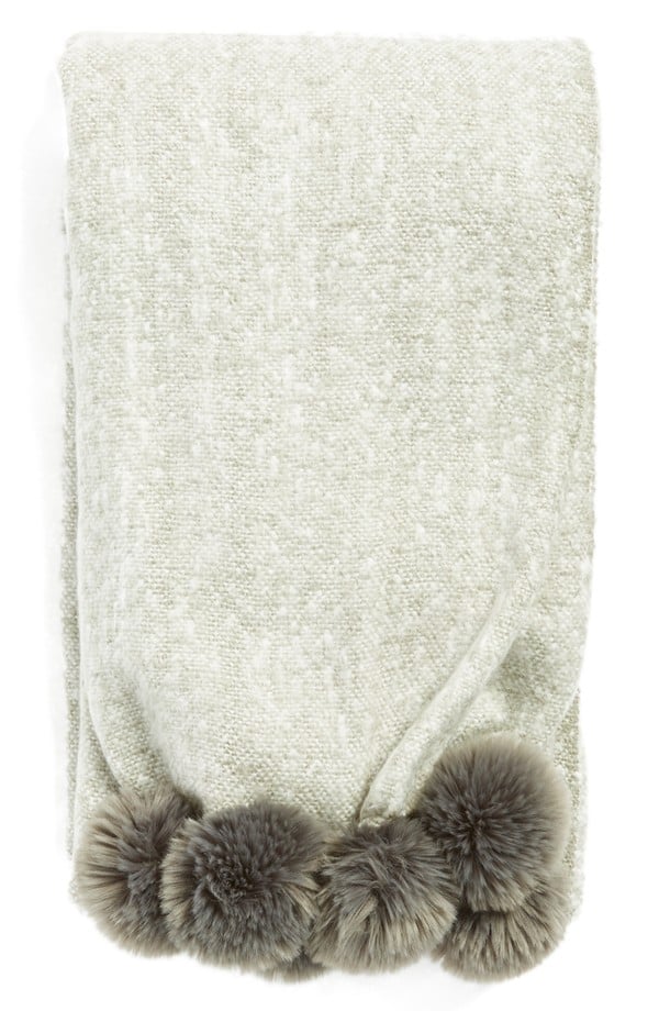 Throw With Pom Poms ($78)