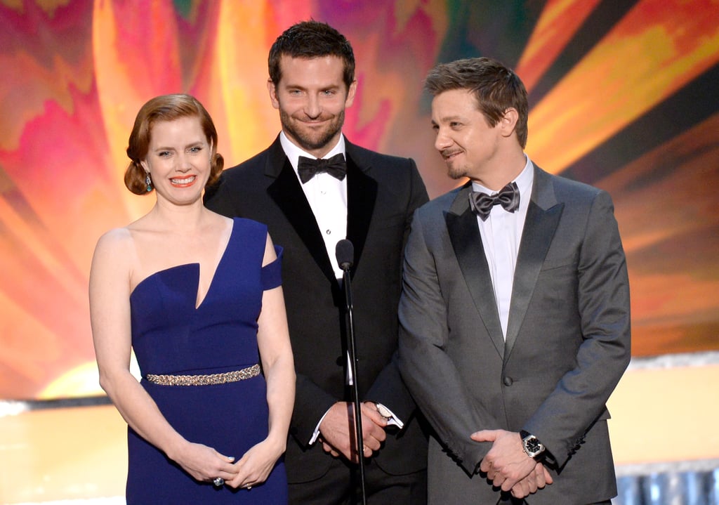 Amy presented an award with Bradley Cooper and Jeremy Renner.