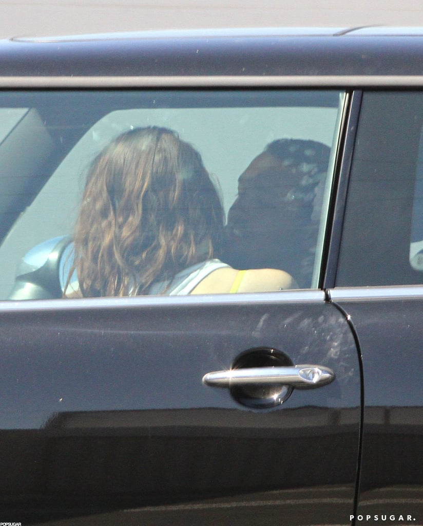 Rupert Sanders and Kristen Stewart cuddled up in her car.